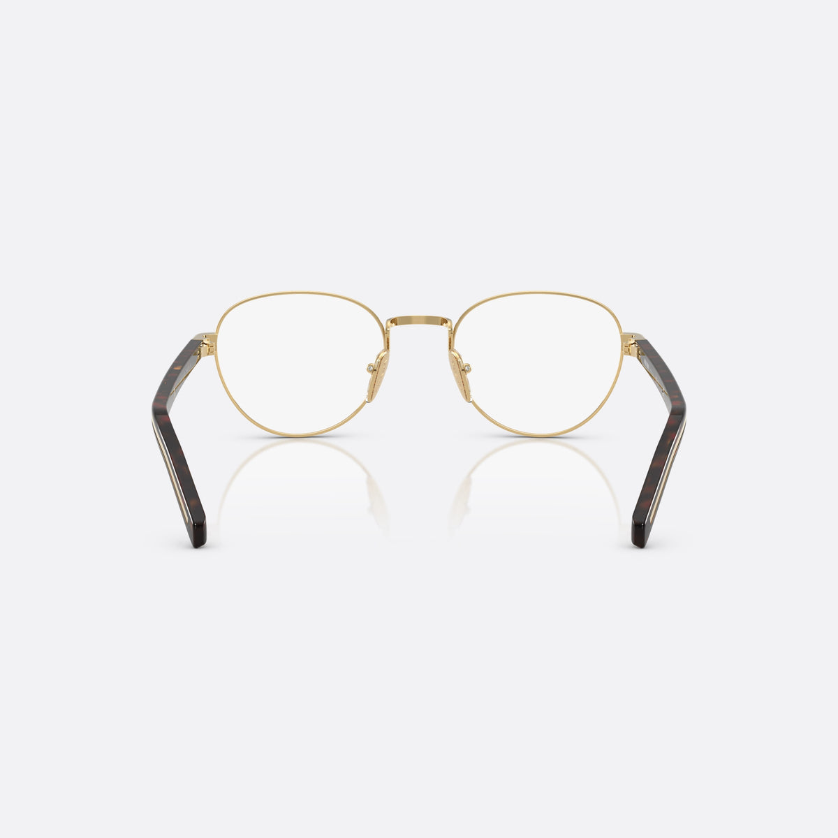 Prada PR B53V 5AK1O1 eyeglasses, gold round frame for women, plain metal bridge, brand lettering on temples, back view