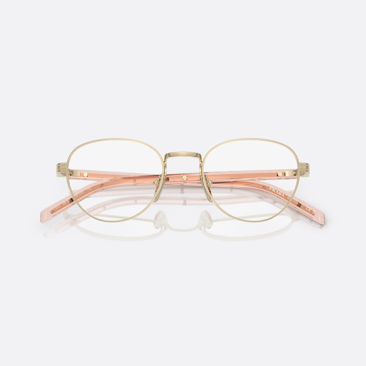 Rame ochelari de vedere Prada PR B53V ACX1O1, rotunzi auriu, pentru femei, punte metalică simplă, literele brandului pe brațe, cu brațele pliate
