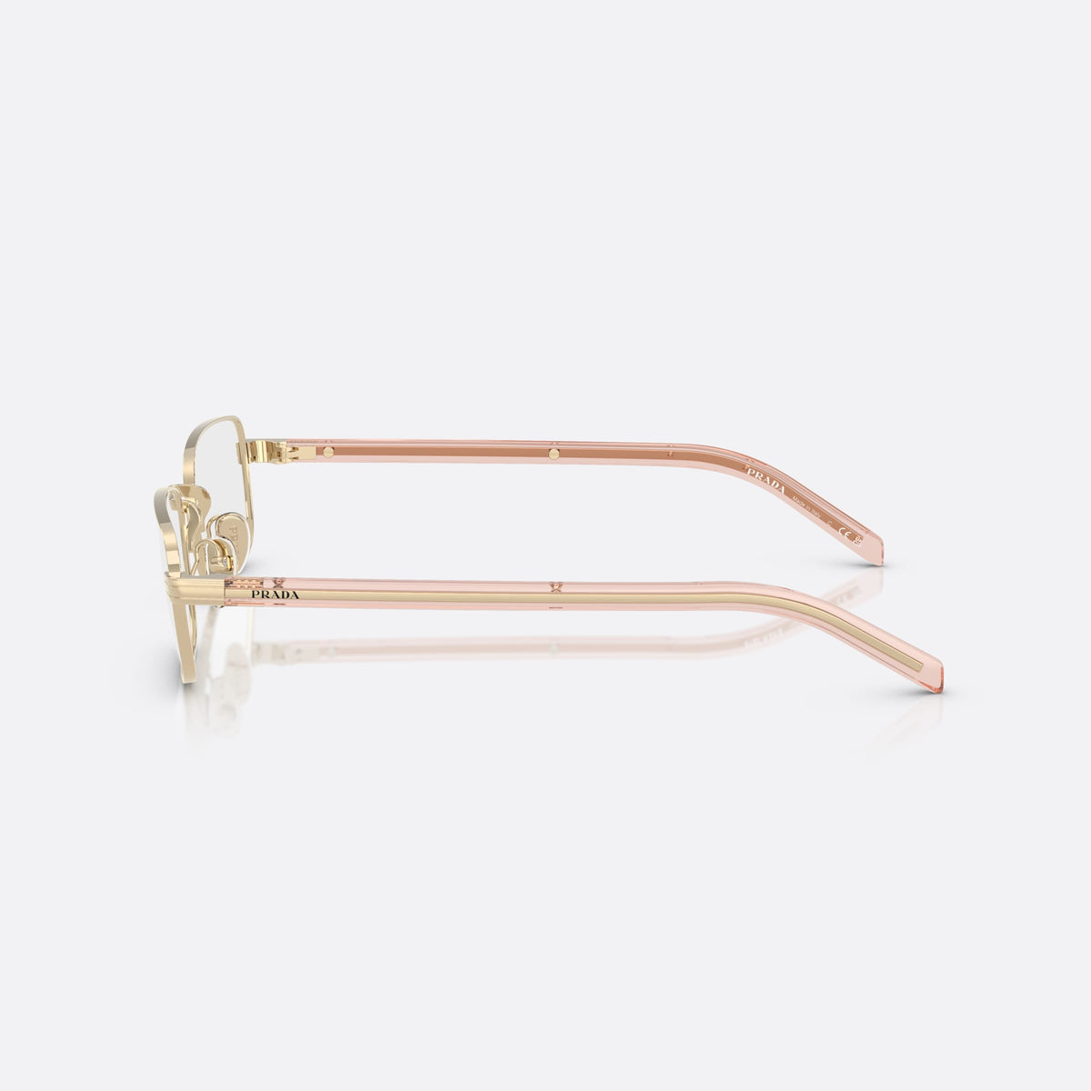 Prada PR B54V ACX1O1 eyeglasses, gold visor frame for women, plain metal bridge, brand lettering on temples, side view