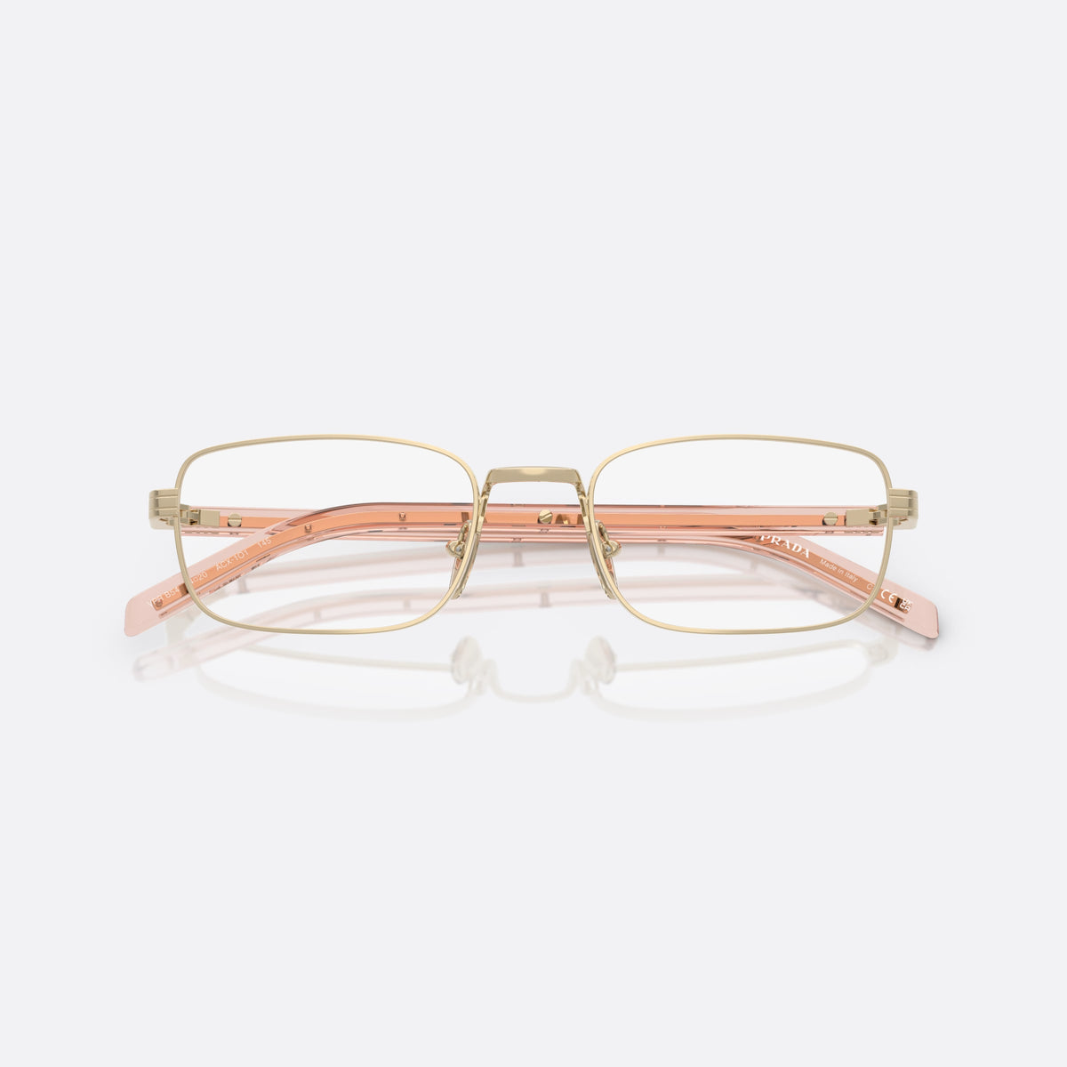 Prada PR B54V ACX1O1 eyeglasses, gold visor frame for women, plain metal bridge, brand lettering on temples, folded