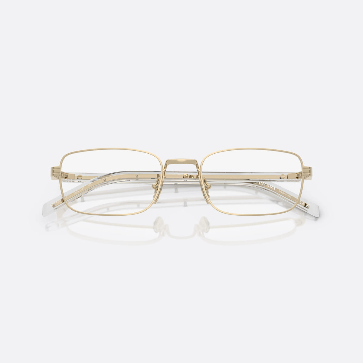 Prada PR B54V ZVN1O1 eyeglasses, gold visor frame for women, plain metal bridge, brand lettering on the temples, folded