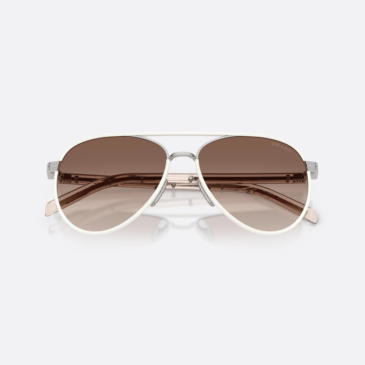 Prada PR B57S 23E10S sunglasses, silver pilot frame for women, double bridge with metal top, folded