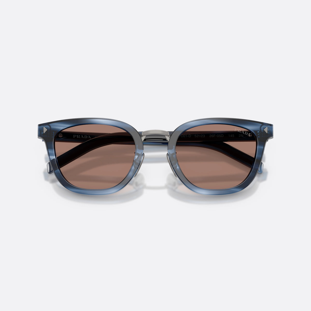 Prada PR C01SD 26F05D sunglasses, blue cat eye frame for men, brand logo on lens, flat temples with slim profile, folded