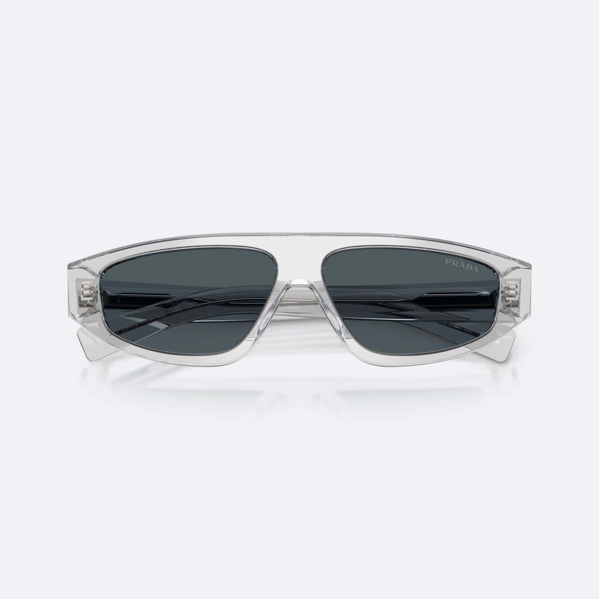 Prada PR C02S 17P70B sunglasses, grey irregular frame for men, plain integrated bridge, brand logo on lens, full rim frame, folded