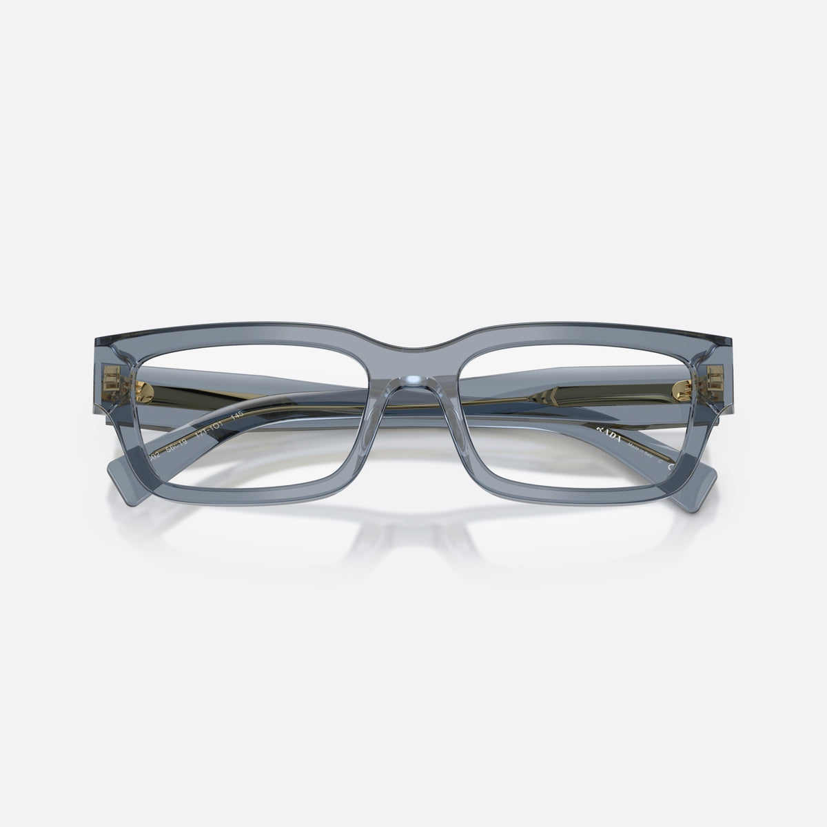 Prada PR C02V 17T1O1 eyeglasses, blue pillow frame for men, plain bridge, integrated into front, wide tapered temples, folded