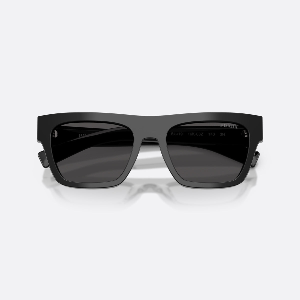 Prada PR C03S 16K08Z sunglasses, black rectangle frame for men, plain bridge, brand lettering on temples, full-rim frame, folded