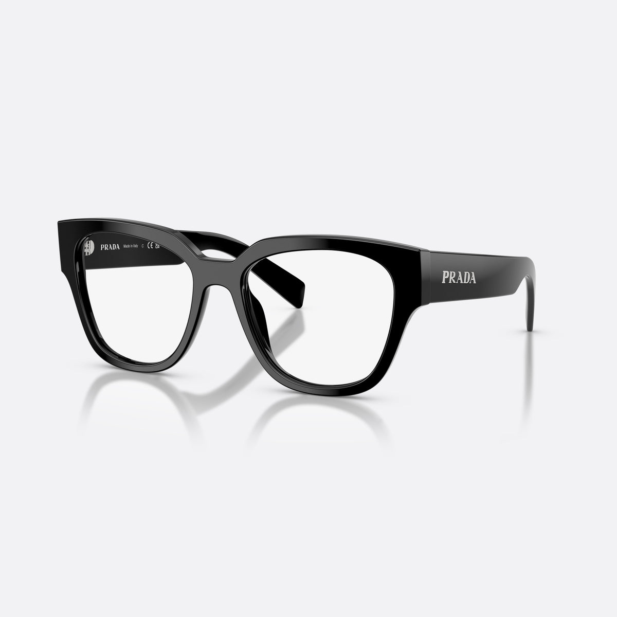 Prada PR C06V 16K1O1 eyeglasses, black oval frame for women, plain integrated bridge, brand lettering on temples