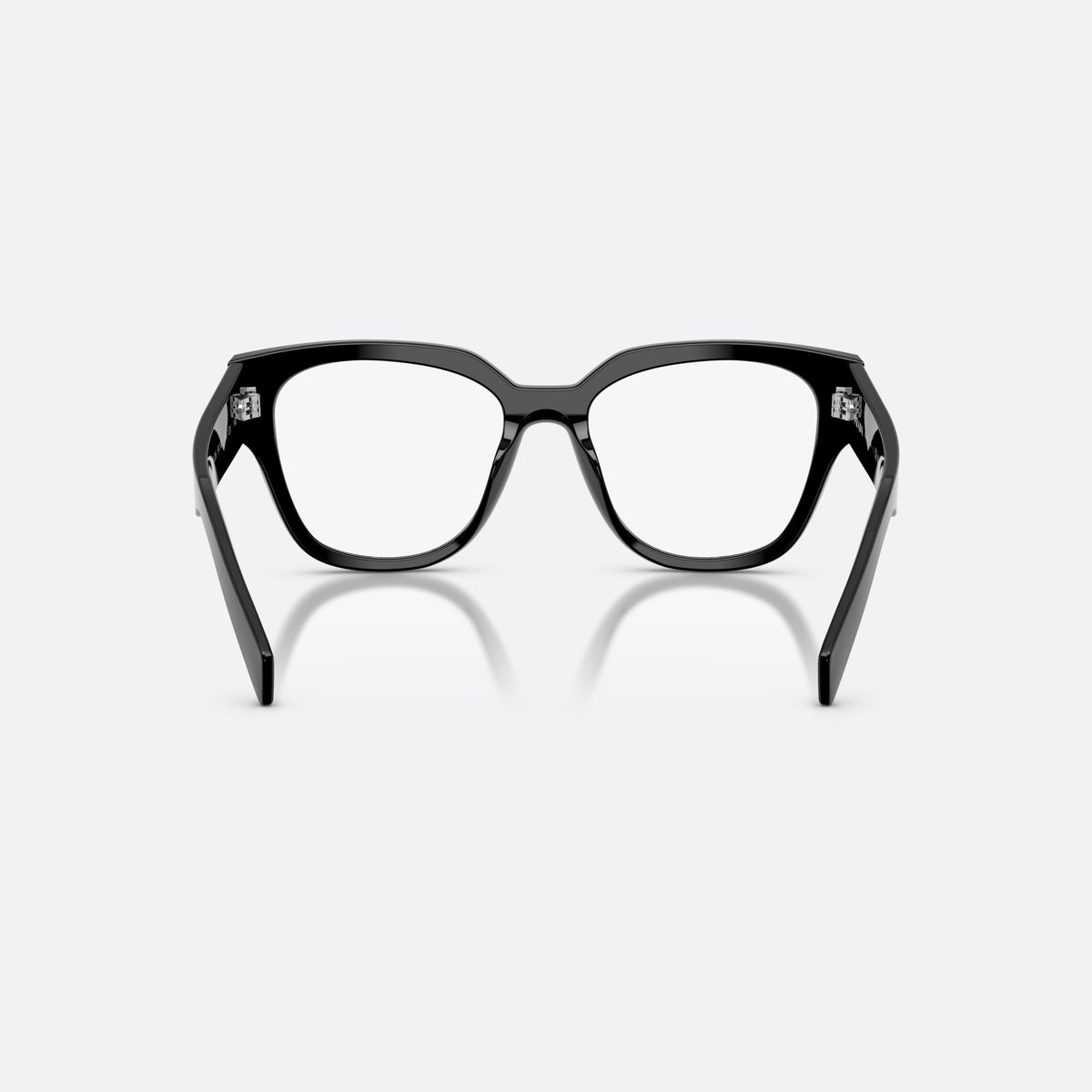 Prada PR C06V 16K1O1 eyeglasses, black oval frame for women, plain integrated bridge, brand lettering on temples, back view