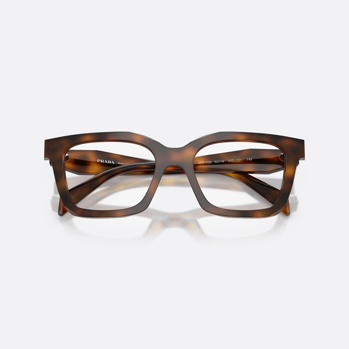 Prada PR C08V 20D1O1 eyeglasses, havana irregular frame for women, plain saddle style bridge, brand logo plaque on temple, folded