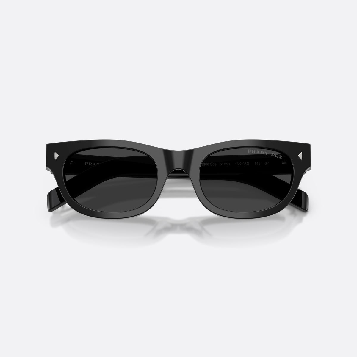 Prada PR C09S 16K08G sunglasses, black cat eye frame for men, keyhole bridge, brand lettering on temples, folded