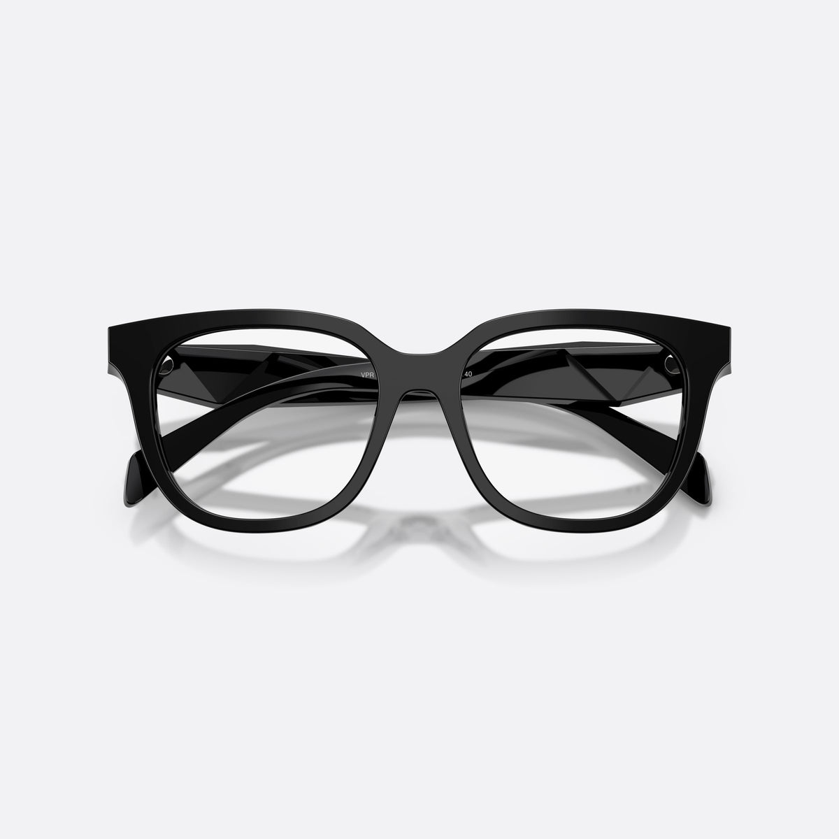 Prada PR C11V 16K1O1 eyeglasses, black butterfly frame for women, plain bridge, integrated, brand lettering on temples, folded
