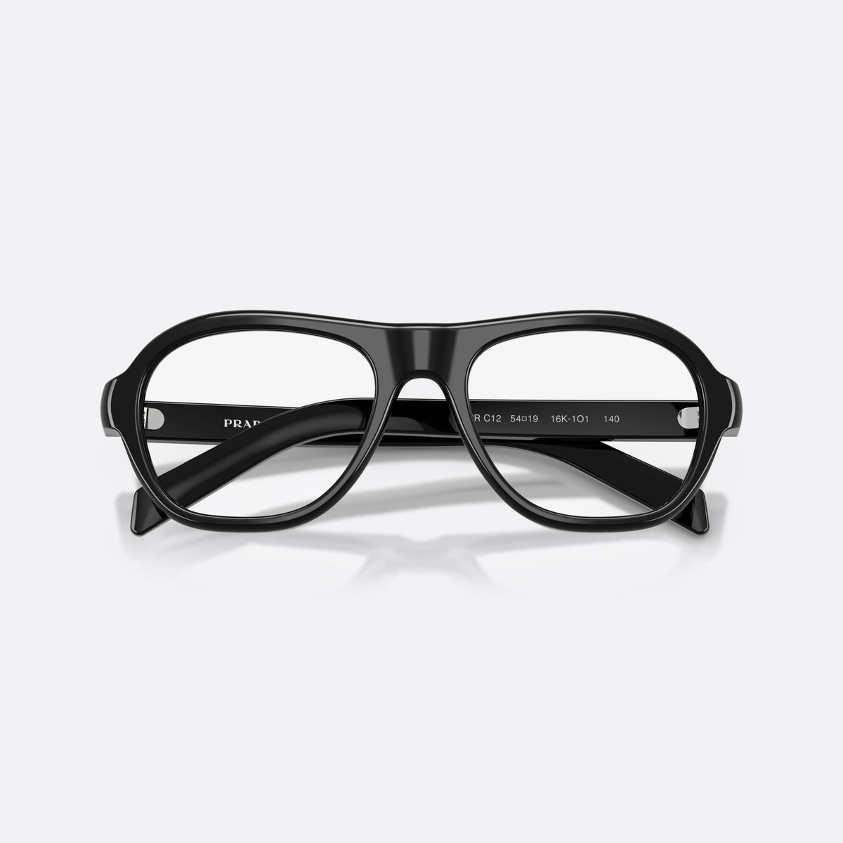 Prada PR C12V 16K1O1 eyeglasses, black pillow frame for women, plain bridge, integrated into front, slim tapered temples, folded