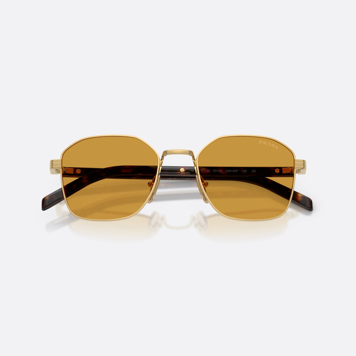 Prada PR C50S 5AK50P sunglasses, gold square frame for men, plain metal bridge, brand lettering on temples, folded