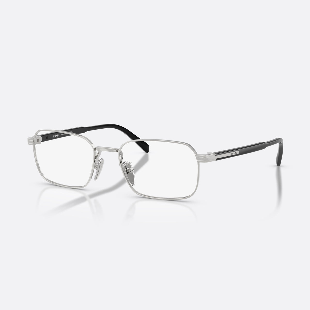 Prada PR C50VD 1BC1O1 eyeglasses, silver pillow frame for men, plain metal bridge, brand lettering on the temples