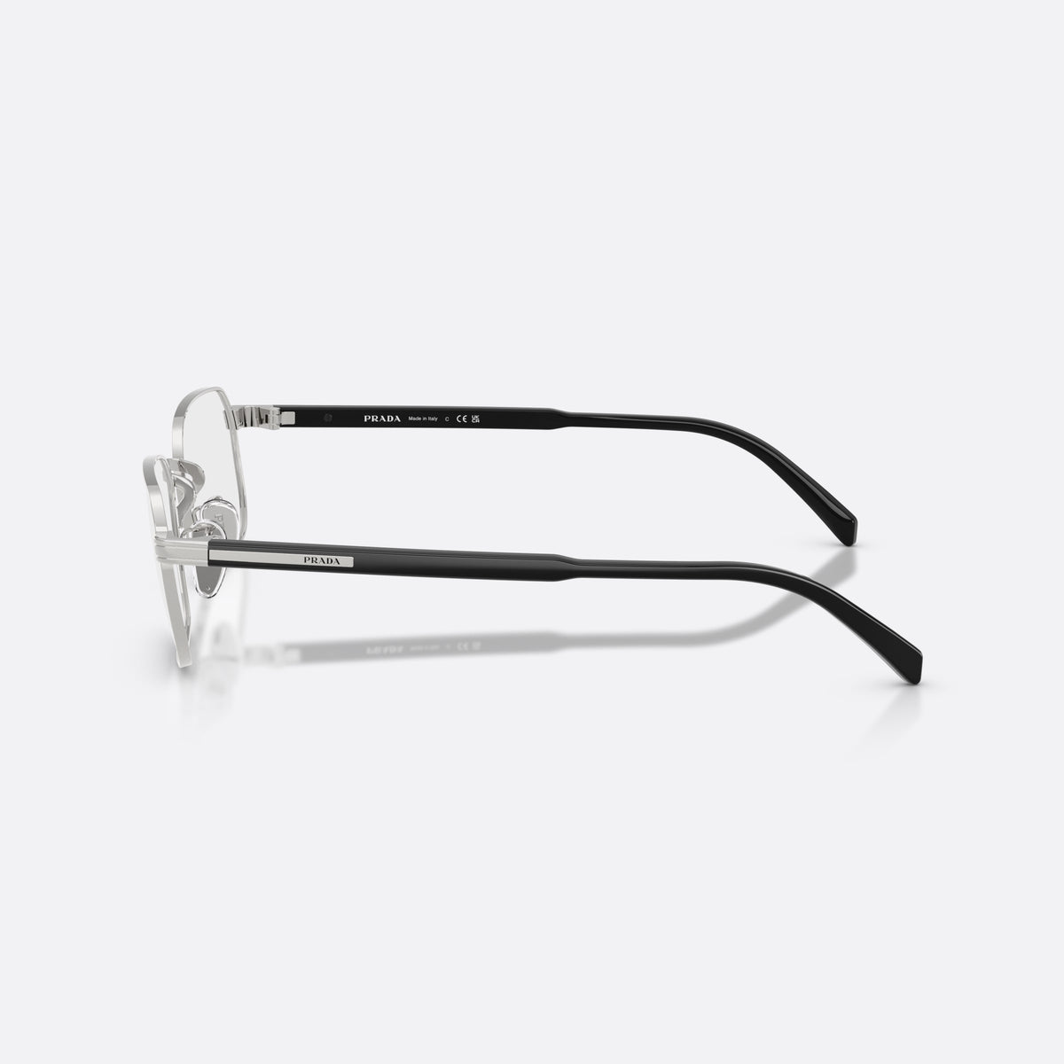Prada PR C50VD 1BC1O1 eyeglasses, silver pillow frame for men, plain metal bridge, brand lettering on the temples, side view