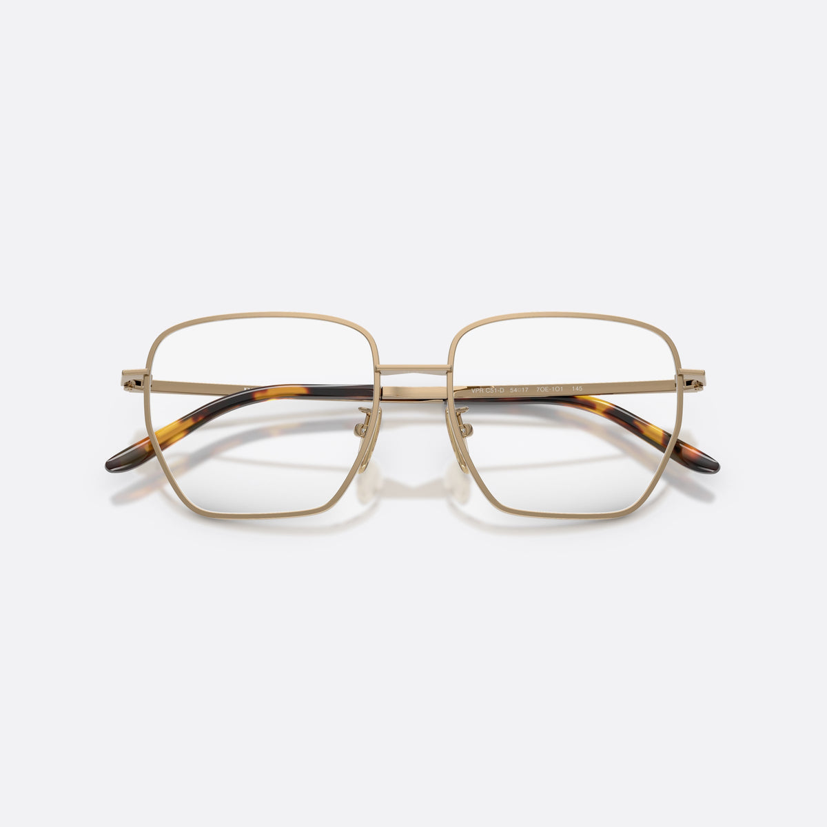 Prada PR C51VD 7OE1O1 eyeglasses, brown square frame for women, plain metal bridge, brand lettering on temples, folded