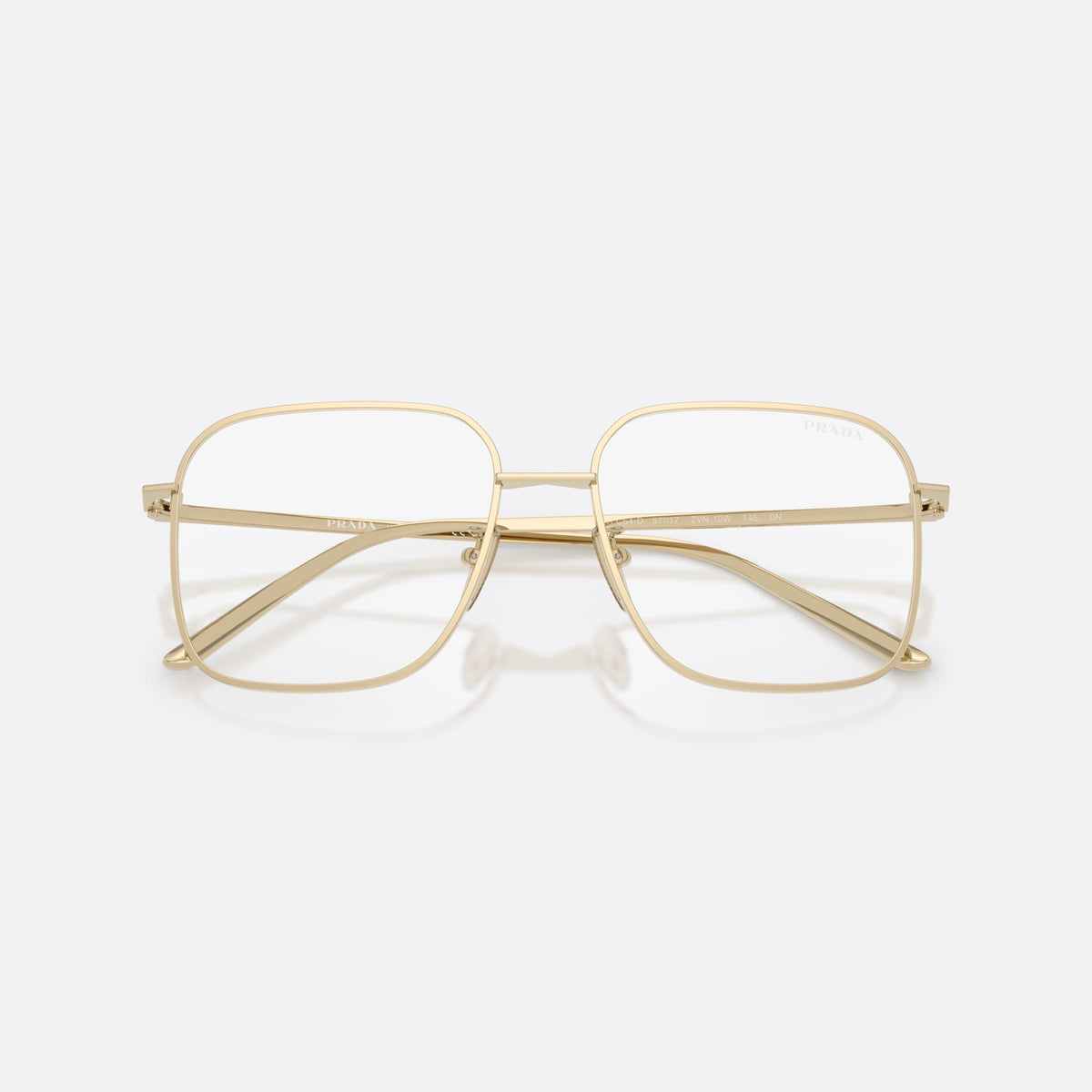 Prada PR C54SD ZVN10W sunglasses, gold square frame for women, double bridge with metal bar, brand lettering on temples, folded