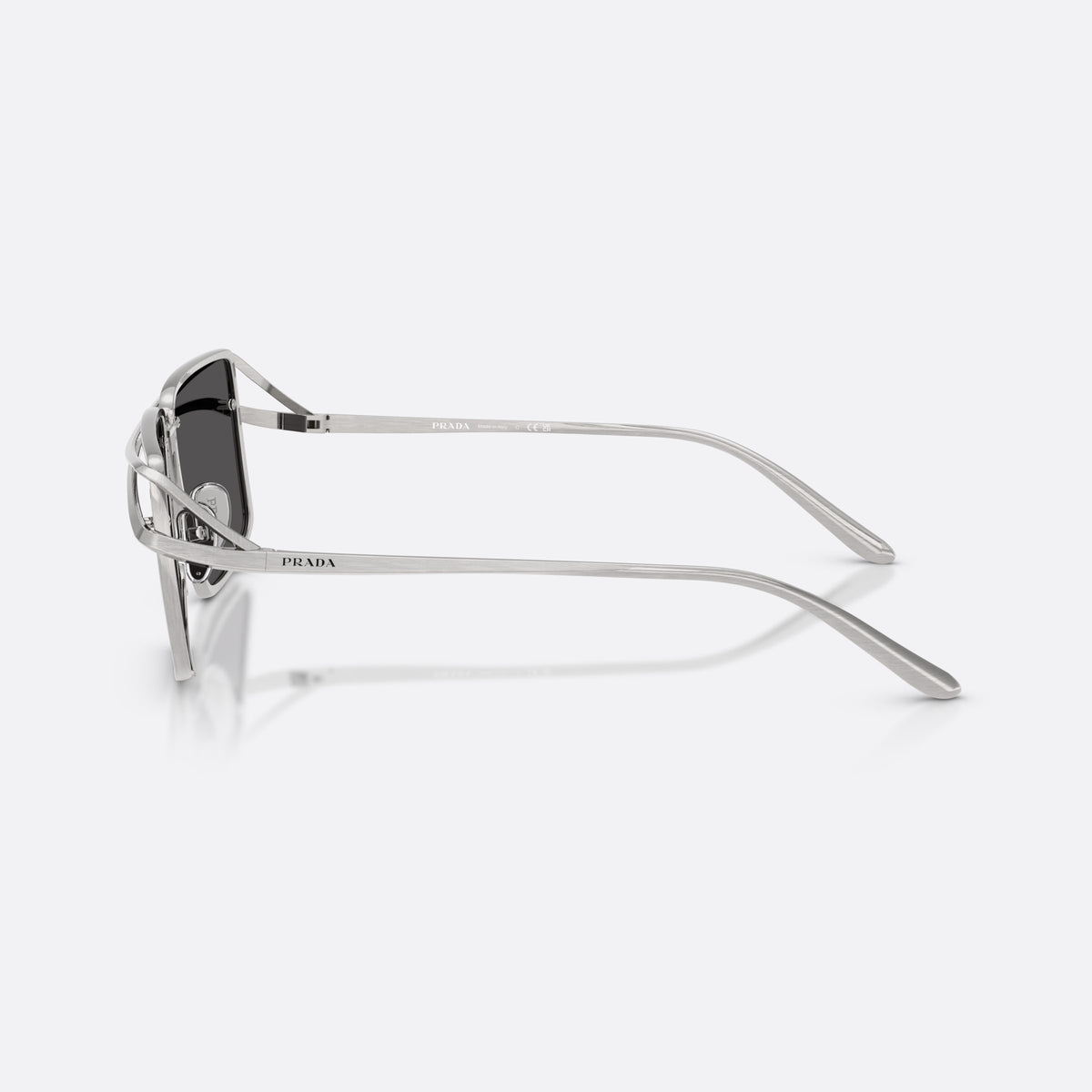 Prada PR C55S 28C08Z sunglasses, silver irregular frame for men, double metal bridge, brand lettering on temples, side view