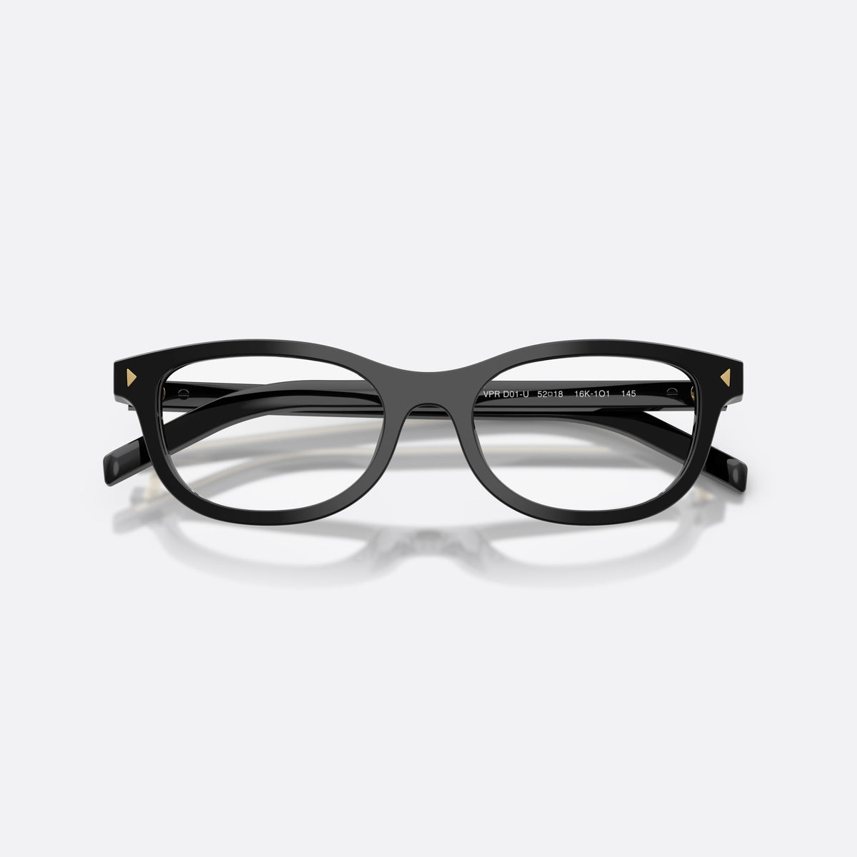 Prada PR D01VU 16K1O1 eyeglasses, black oval frame for women, keyhole bridge, brand lettering on temples, folded