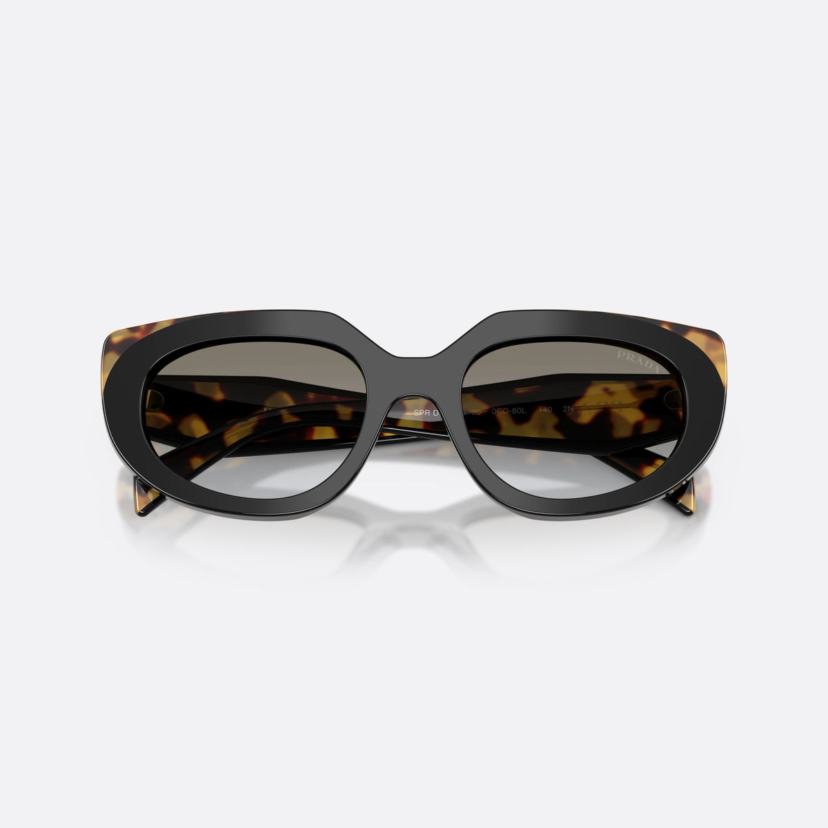 Prada PR D02S 0CD80L sunglasses, black oval frame for women, plain double bridge, brand logo on temple, folded