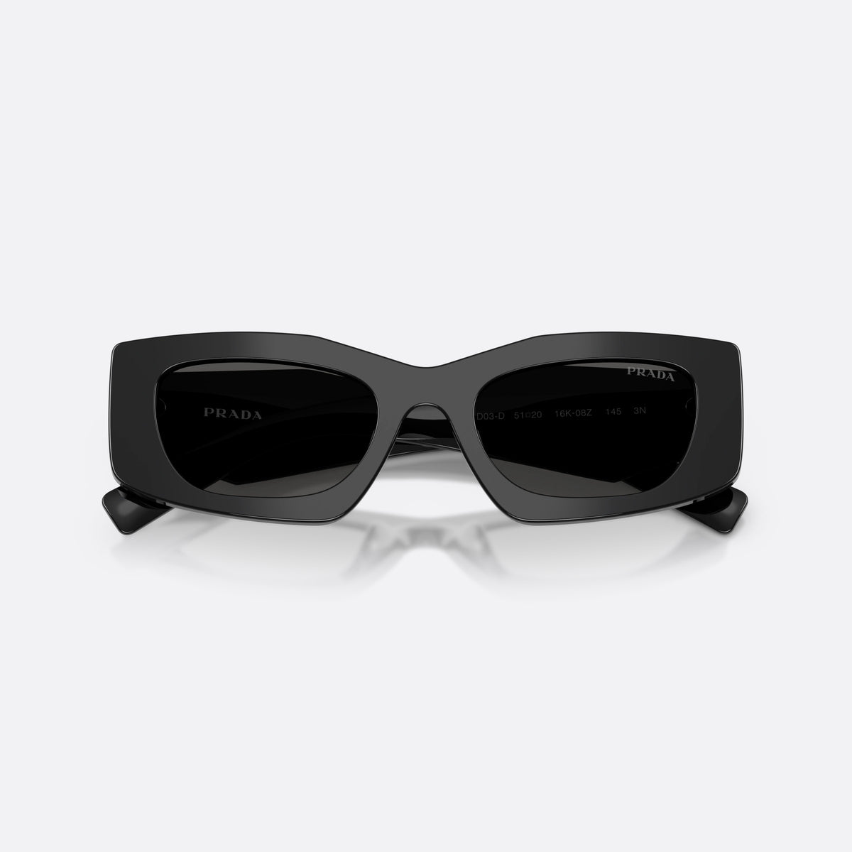 Prada PR D03SD 16K08Z sunglasses, black rectangle frame for women, plain bridge with shallow curve, wide tapered temples, folded