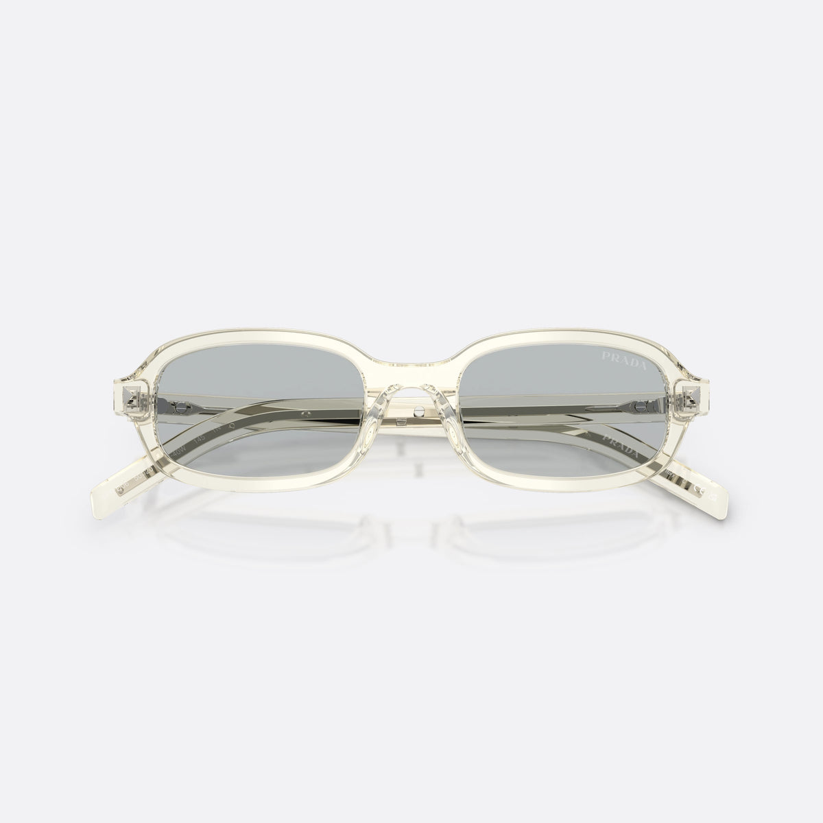Prada PR D06S 12X40W sunglasses, brown oval frame for women, plain double bridge, brand lettering on temples, folded