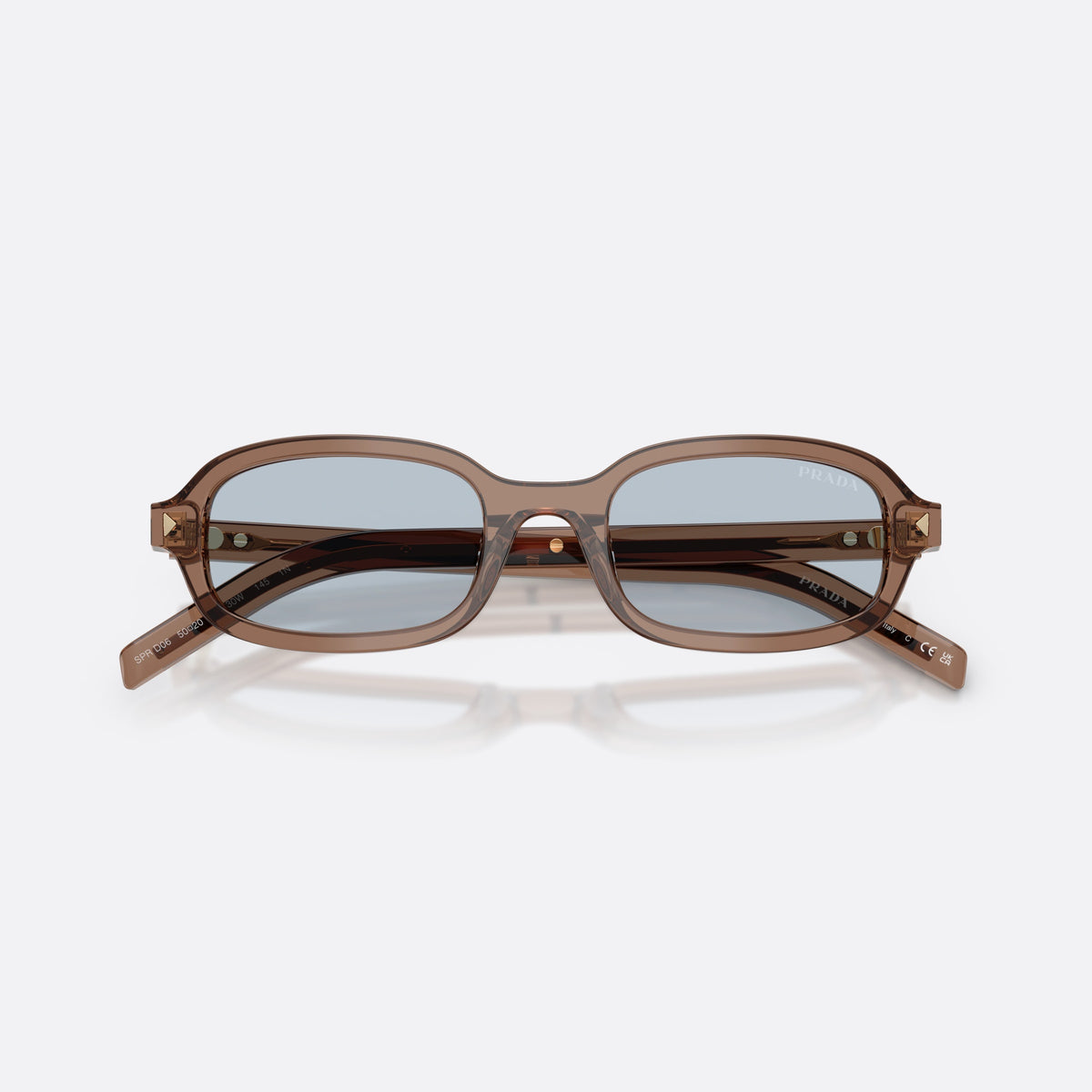 Prada PR D06S 28I30W sunglasses, clear oval frame for women, plain bridge, brand lettering on temples, full-rim frame, folded