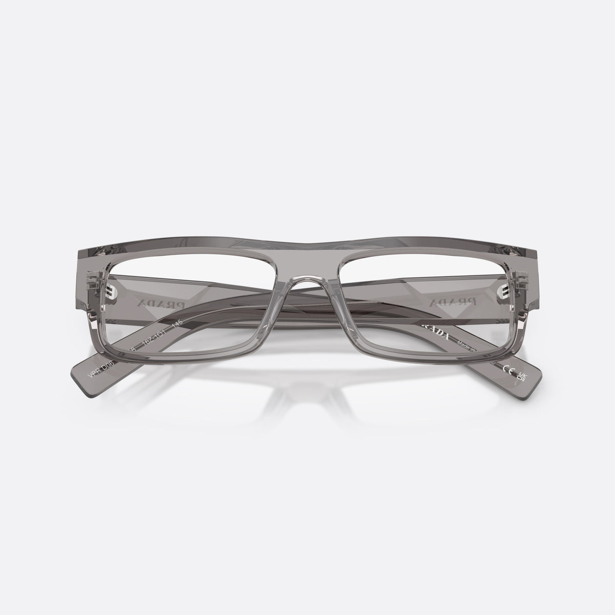 Prada PR D06V 16Z1O1 eyeglasses, grey rectangle frame for men, plain bridge with flat top, full-rim thick frame, folded