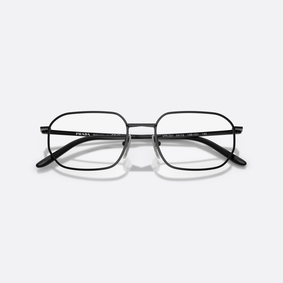 Prada PR D51V 1AB1O1 eyeglasses, black irregular frame for men, double bridge with metal connector, slim flat temples, folded