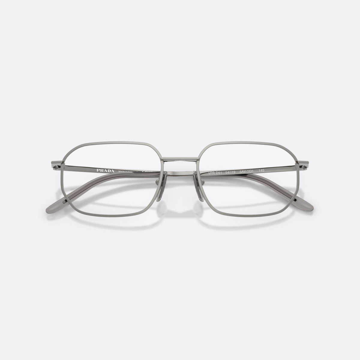 Prada PR D51V 5AV1O1 eyeglasses, grey irregular frame for men, plain metal bridge, brand lettering on temples, folded