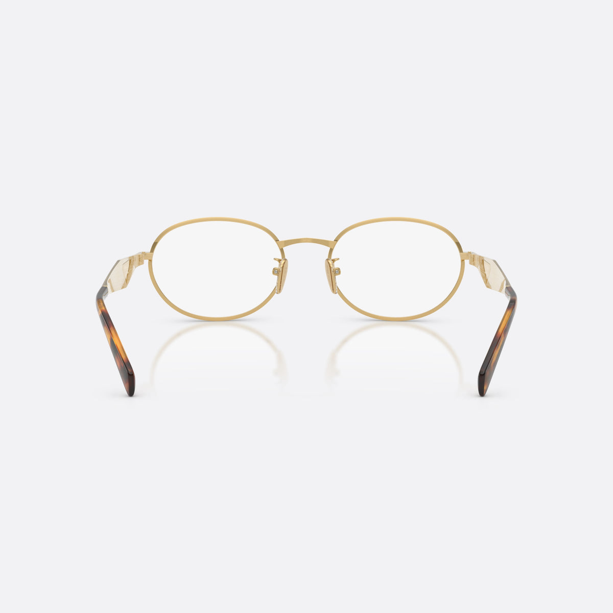 Prada PR D53VD 24J1O1 eyeglasses, gold oval frame for women, plain metal bridge, triangular plaque on temple, back view