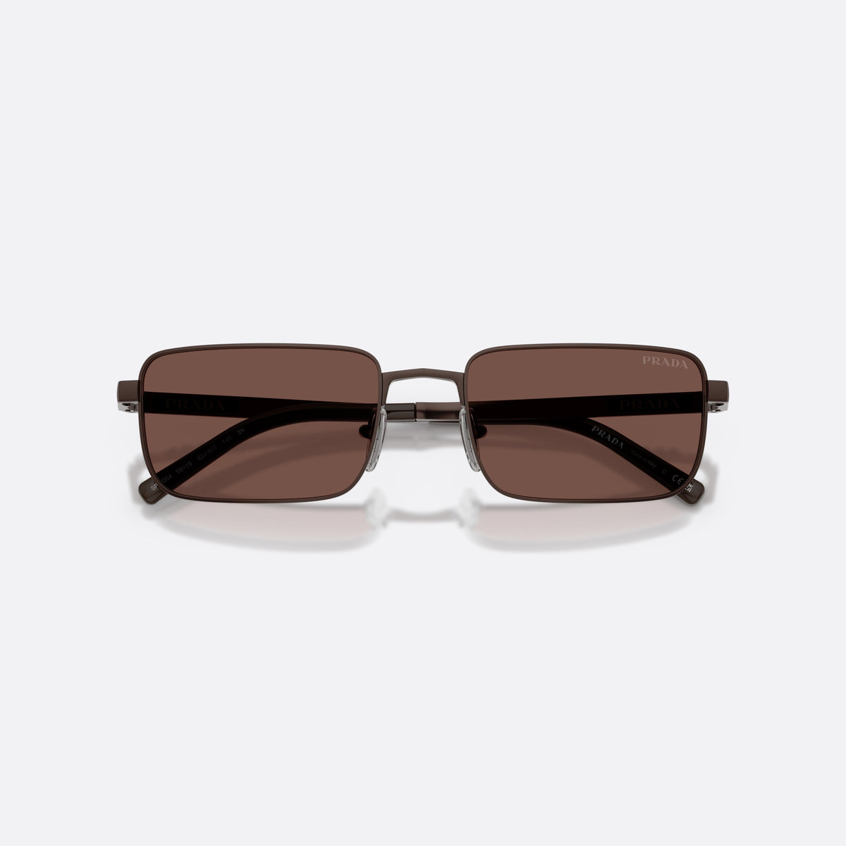 Prada PR D54S 22J80T sunglasses, brown rectangle frame for men, plain metal bridge, brand lettering on temples, folded