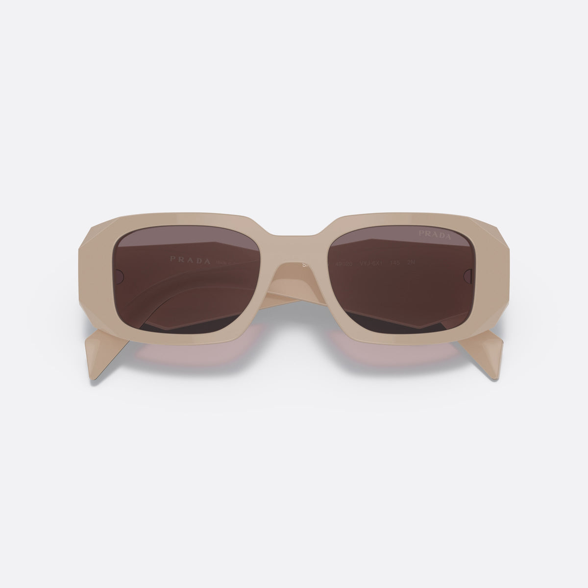 Prada PRADA PR 17WS VYJ-6X1 sunglasses, white geometric frame for women, plain bridge, brand lettering on the temples, full-rim frame, folded