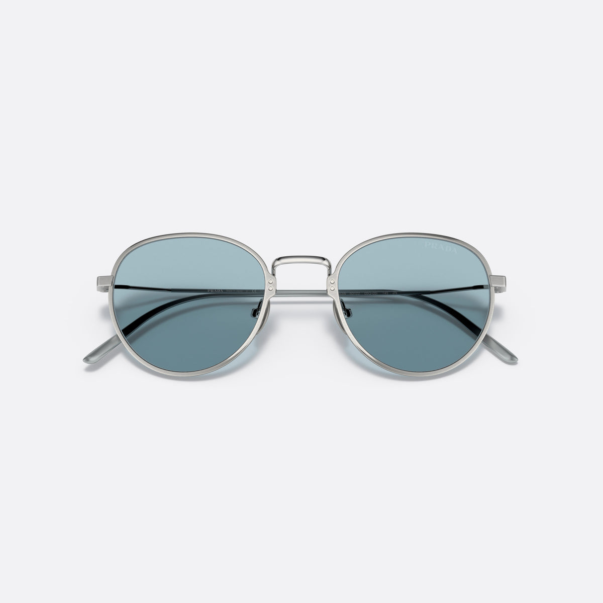 Prada PRADA PR 53WS 05Q-05I sunglasses, silver round frame for men, plain metal bridge, brand lettering on lens, folded