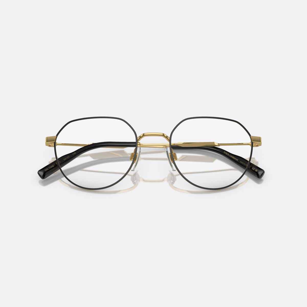 Dolce & Gabbana DG 1349 1311 eyeglasses, black round frame for men, gold-tone metal bridge, small logo plaque on temples, folded