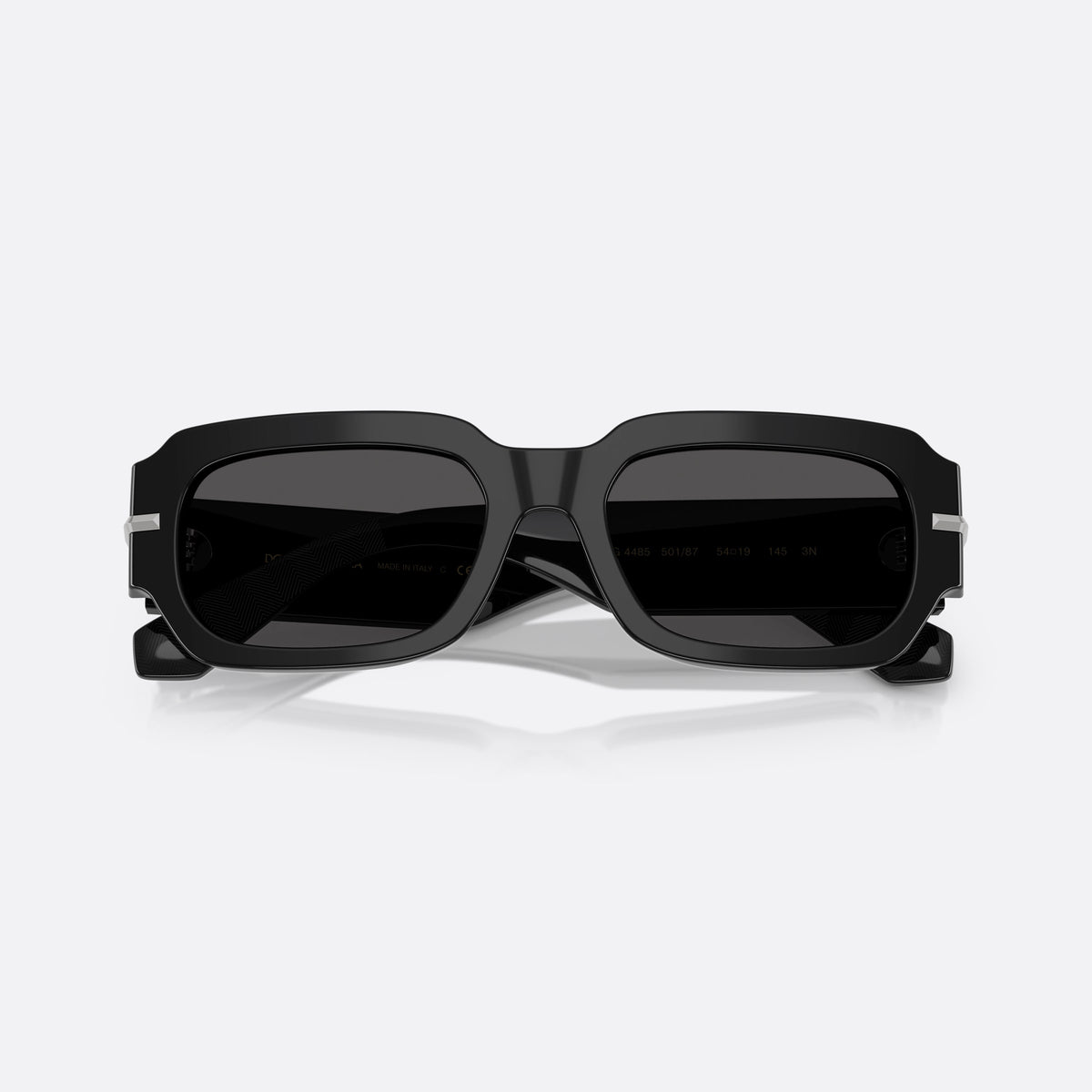 Dolce & Gabbana DG 4485 501/87 sunglasses, black rectangle frame for men, plain bridge, brand lettering on temples, full-rim frame, folded