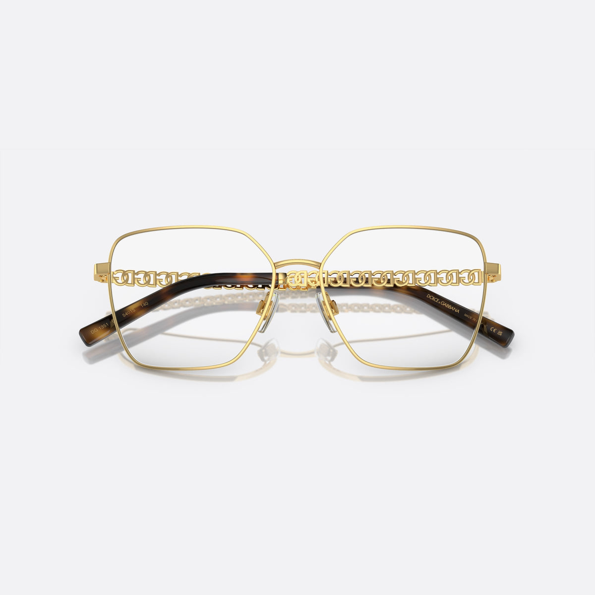 Rame ochelari de vedere Dolce & Gabbana DG1351 02, patrati auriu, pentru femei, punte metalică simplă, literele brandului pe brațe, cu brațele pliate