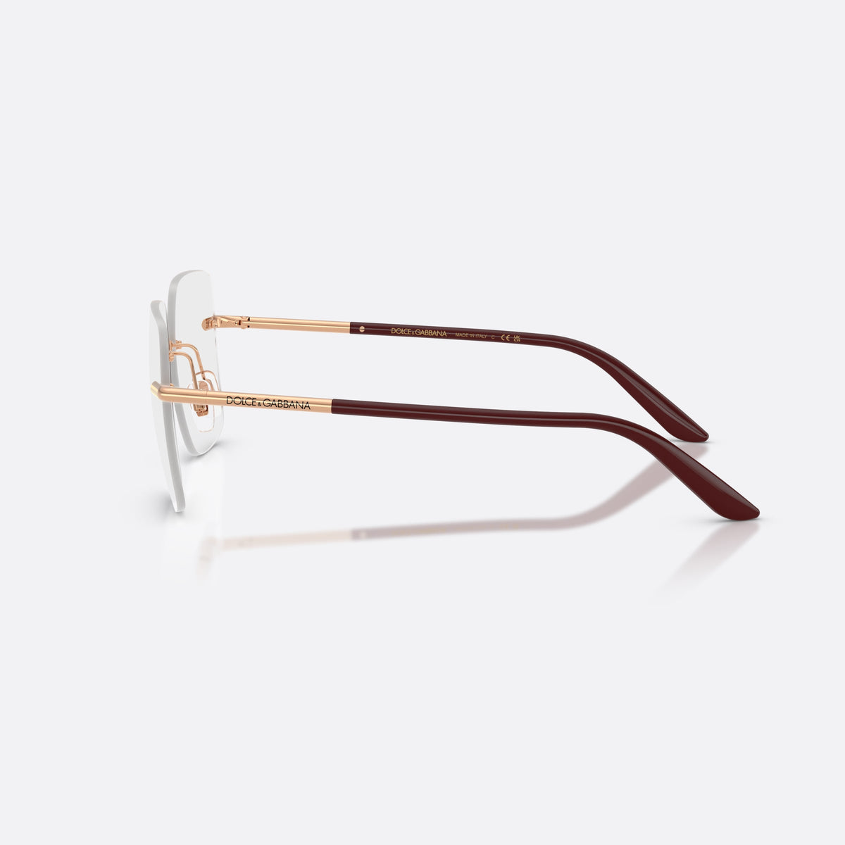 Dolce & Gabbana DG1360 1298 eyeglasses, gold square frame for women, plain metal bridge, brand lettering on temples, side view