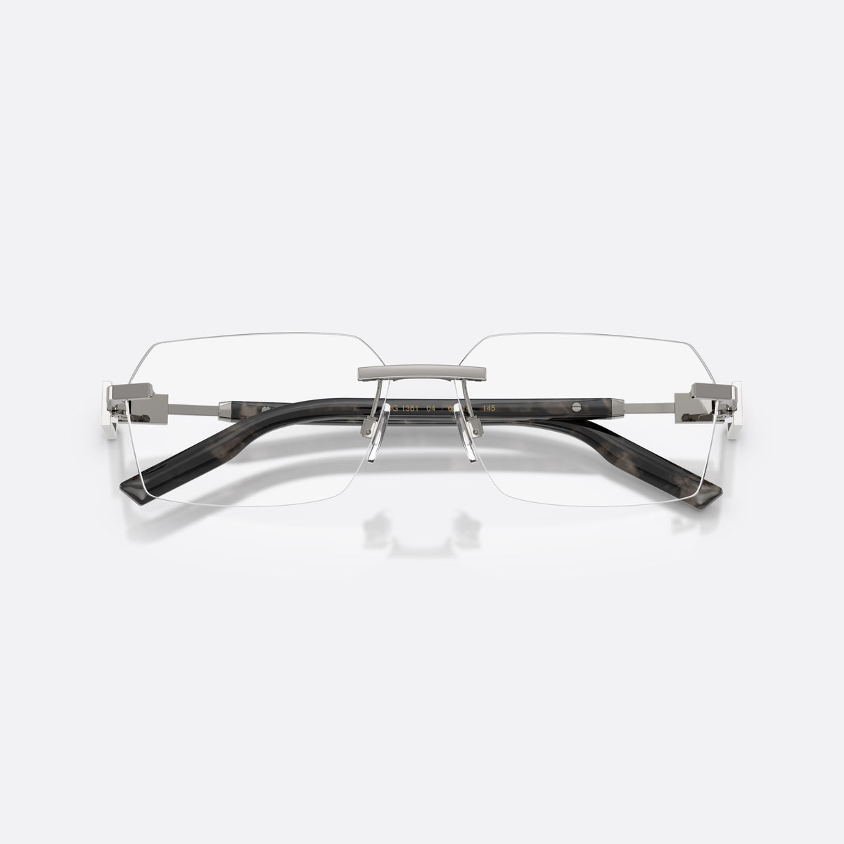 Dolce & Gabbana DG1361 04 eyeglasses, grey rectangle frame for men, flat metal bridge bar, brand lettering on the temples, folded