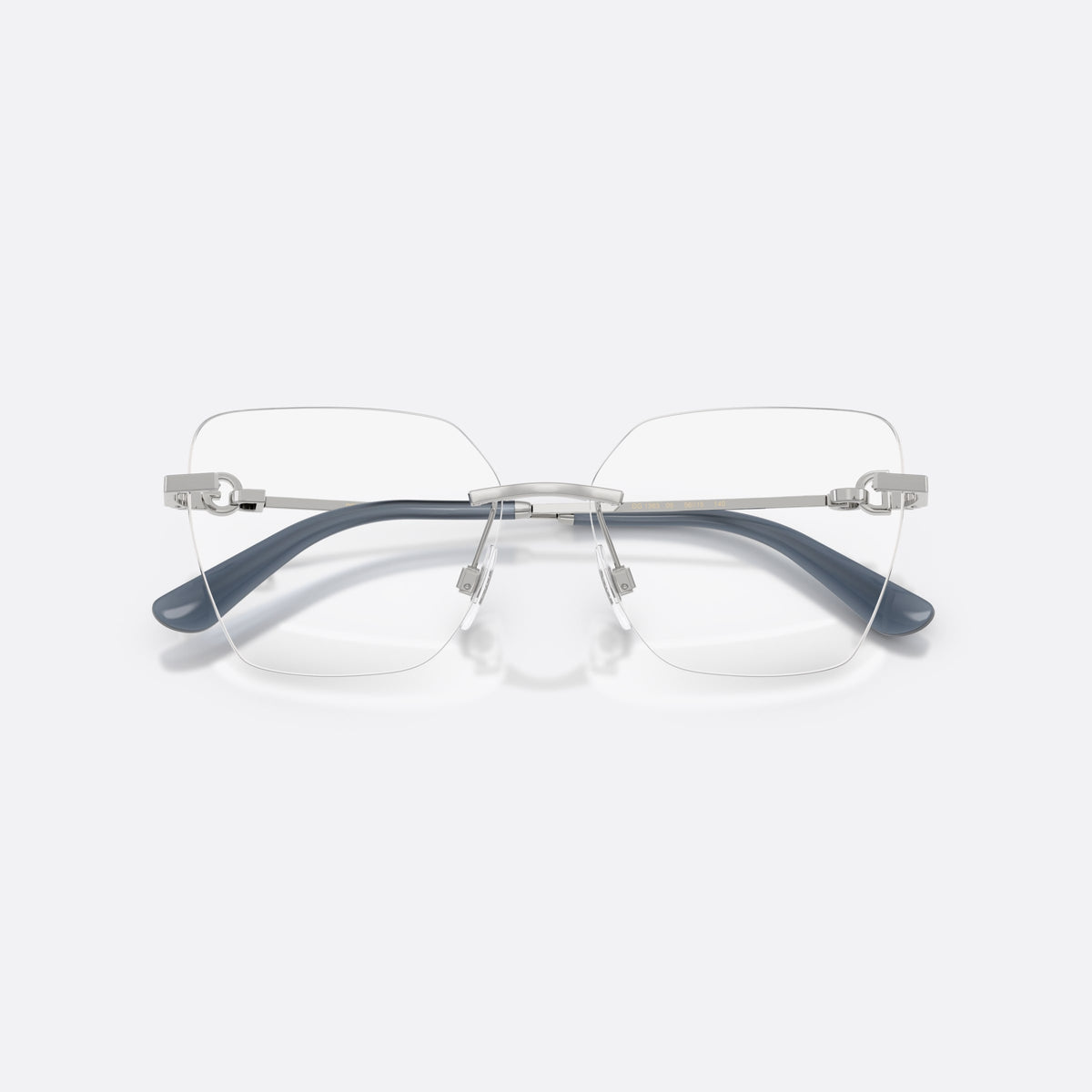 Rame ochelari de vedere Dolce & Gabbana DG1363 05, cat eye argintiu, pentru femei, punte metalică simplă, placă cu logo pe brațe, cu brațele pliate