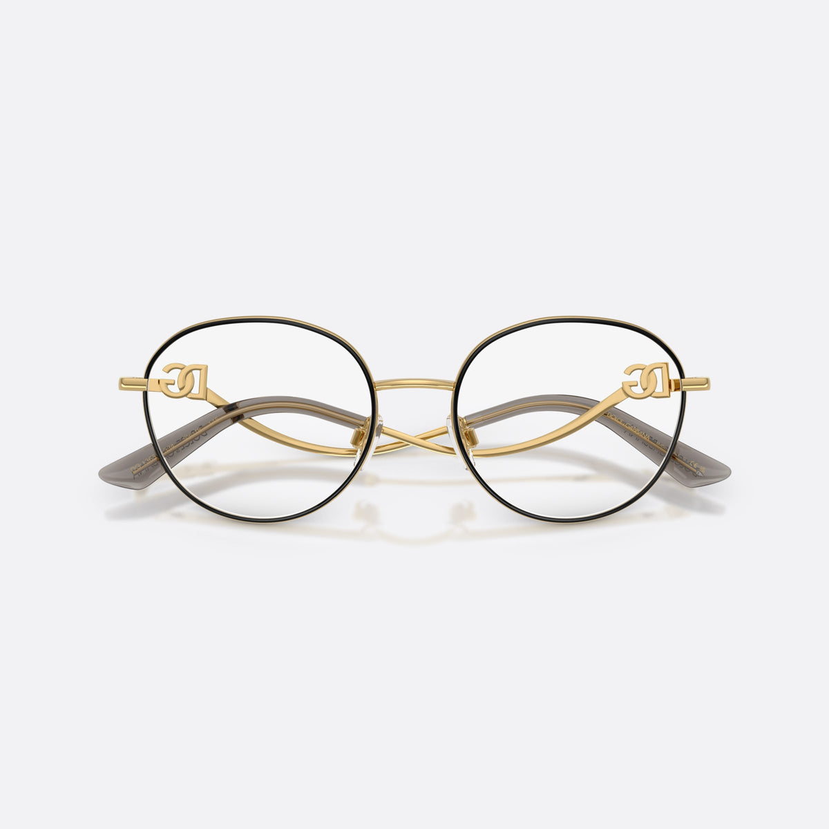 Dolce & Gabbana DG1365 1334 eyeglasses, black round frame for women, plain metal bridge, brand logo plaque on temples, folded