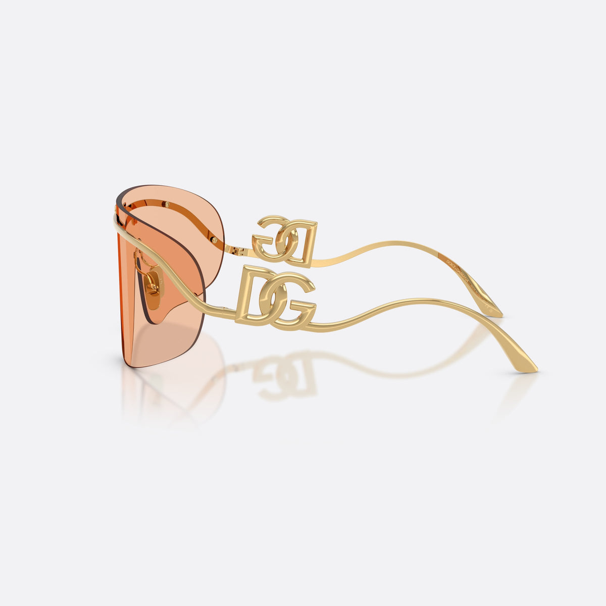 Dolce & Gabbana DG2320 02/73 sunglasses, gold pillow frame for women, integrated metal bridge with dome, side view