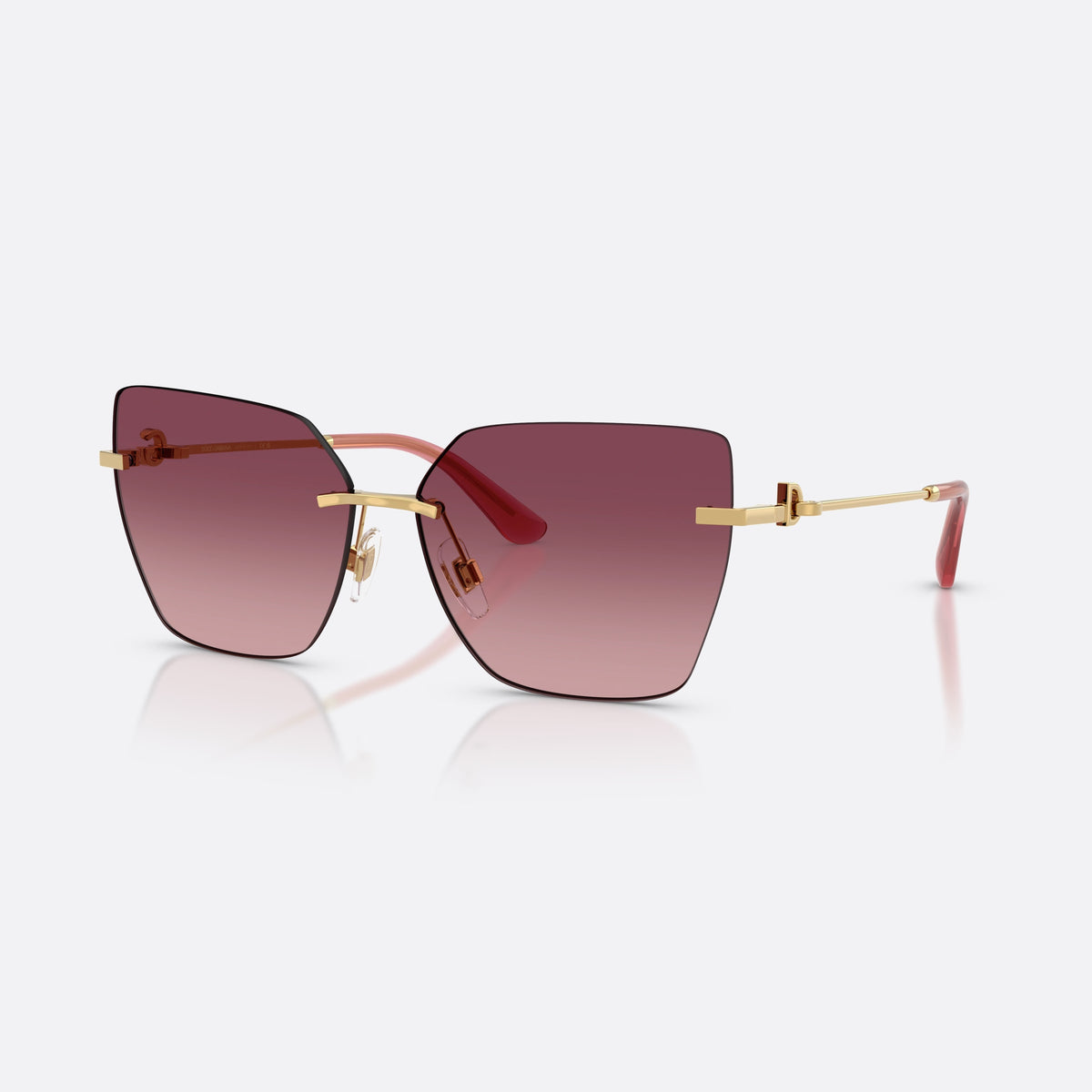 Dolce & Gabbana DG2321 02/8D sunglasses, gold cat eye frame for women, plain metal bridge, brand logo on temples, rimless frame