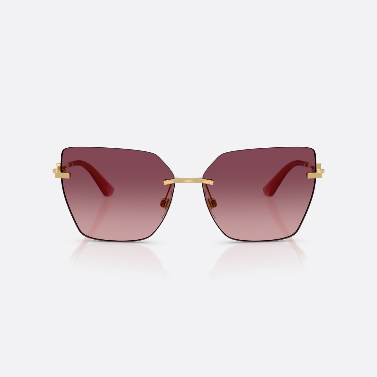 Dolce & Gabbana DG2321 02/8D sunglasses, gold cat eye frame for women, plain metal bridge, brand logo on temples, rimless frame, front view