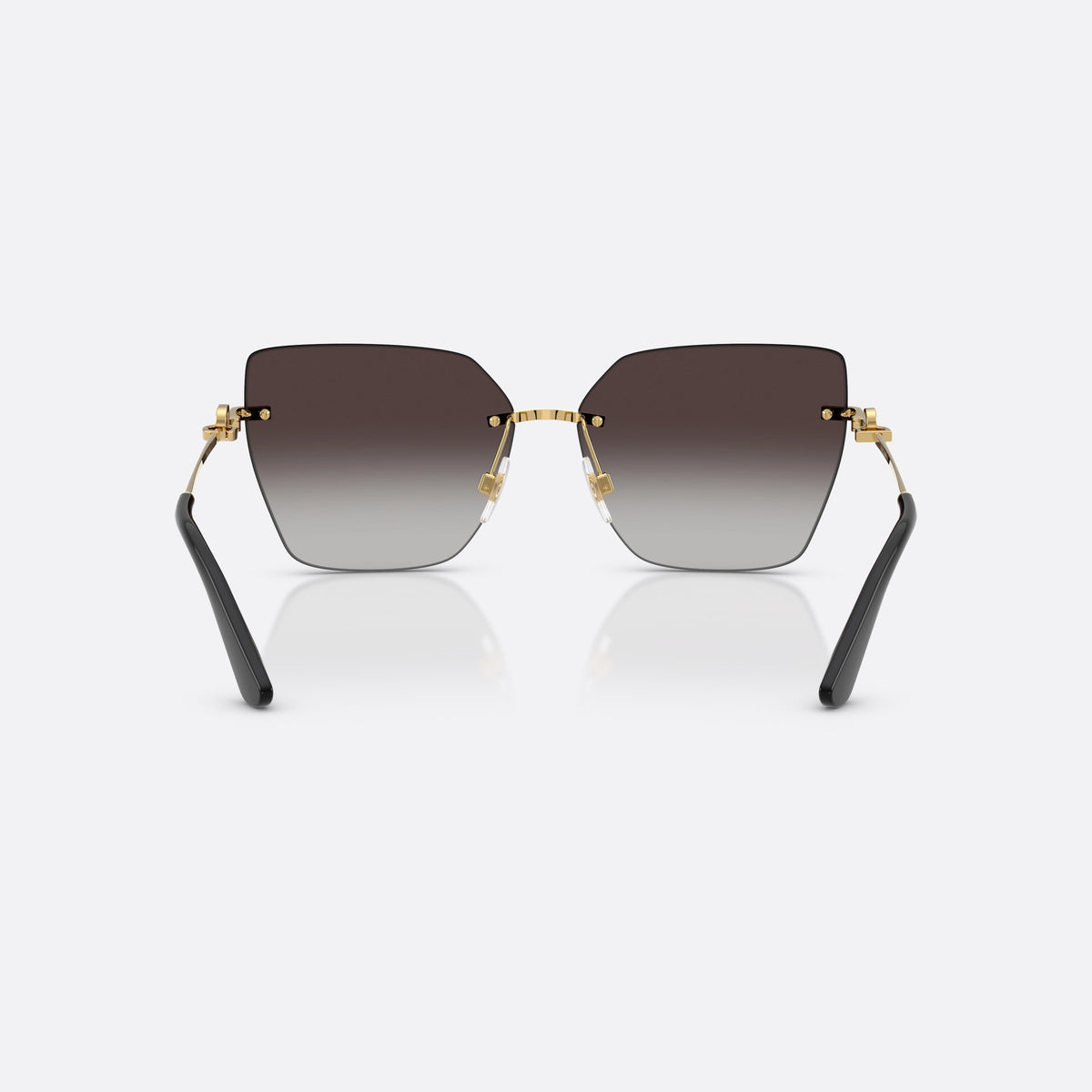 Dolce & Gabbana DG2321 02/8G sunglasses, gold cat eye frame for women, plain metal bridge, brand logo on temples, back view