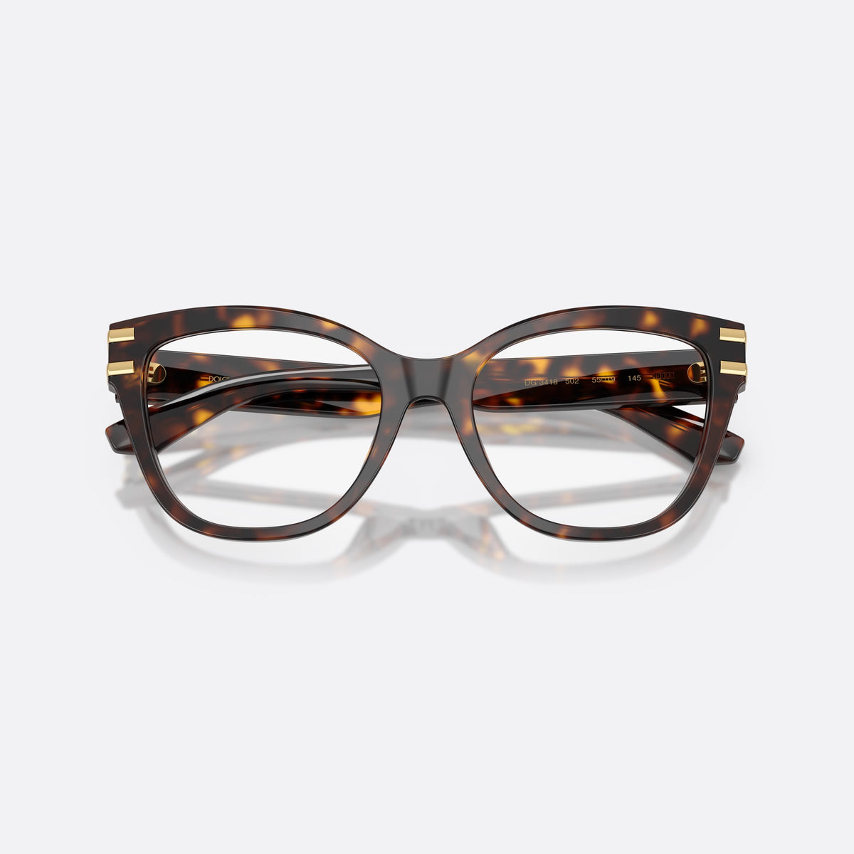 Dolce & Gabbana DG3418 502 eyeglasses, havana butterfly frame for women, plain acetate bridge, brand logo plaque on temples, folded