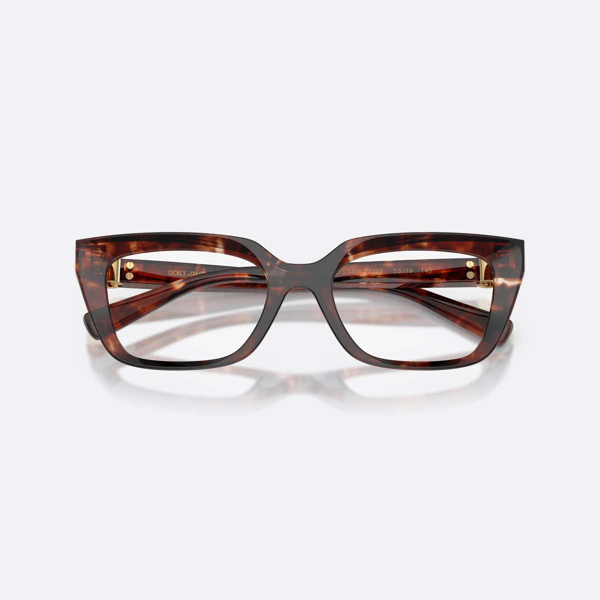 Dolce & Gabbana DG3436 3222 eyeglasses, red rectangle frame for women, plain saddle-style bridge, brand lettering on temples, folded