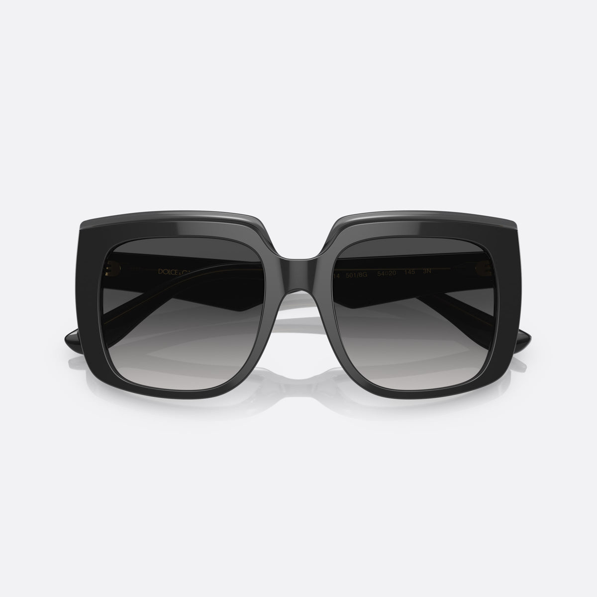 Dolce & Gabbana DG4414 501/8G sunglasses, black square frame, unisex, double bridge, brand lettering on temple, full-rim frame, folded