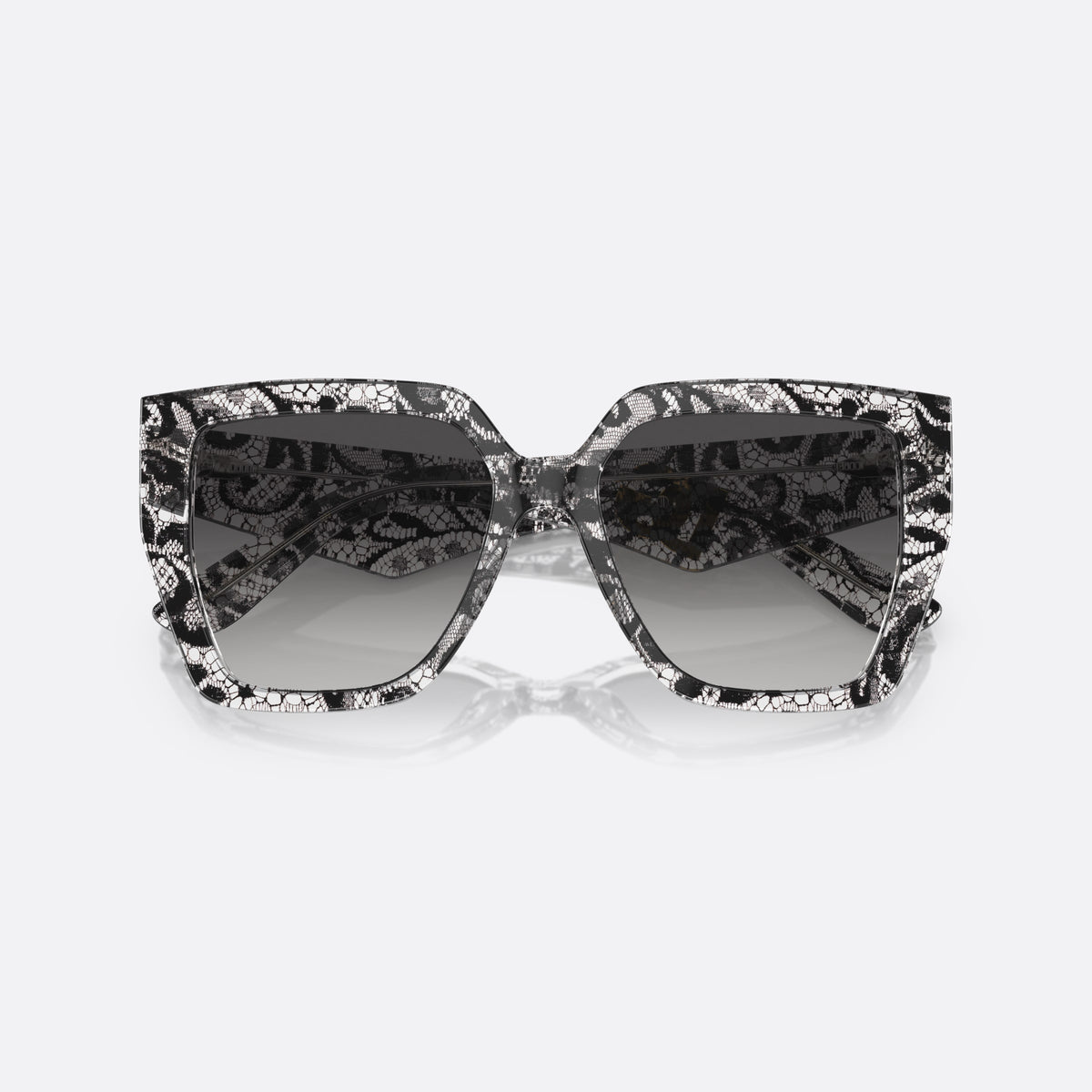 Dolce & Gabbana DG4438 32878G sunglasses, black square frame for women, plain bridge, integrated into frame, brand logo on temple, folded