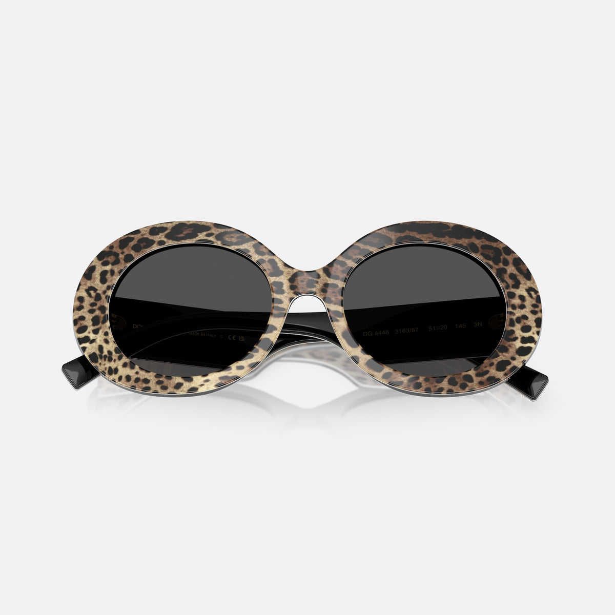 Dolce & Gabbana DG4448 316387 sunglasses, black oval frame for women, plain acetate bridge, brand logo on temples, folded